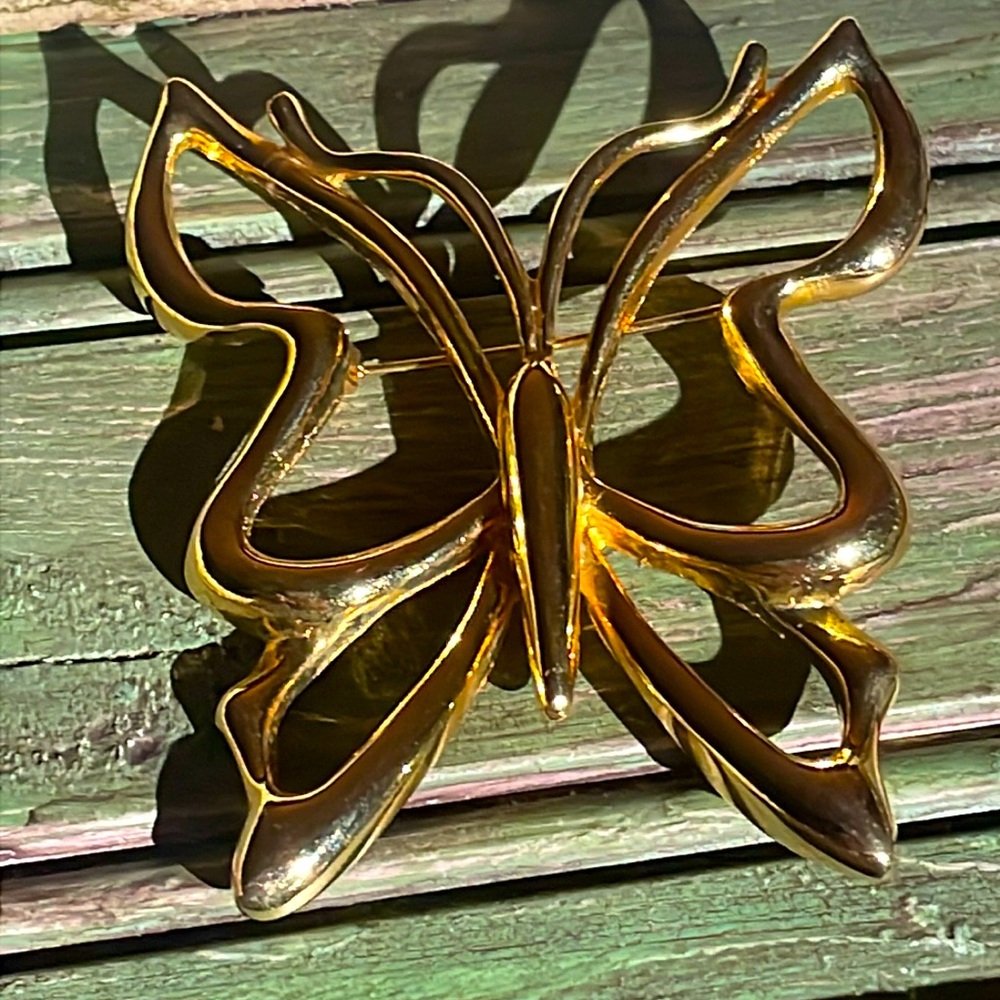 Gold butterfly brooch
